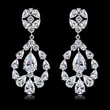 Show details for Copper or Brass White Dangle Earrings at Great Low Price