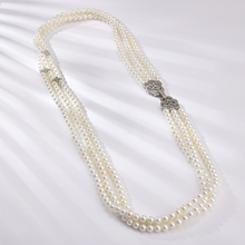 Show details for Inexpensive Platinum Plated White Long Chain Necklace of Original Design