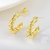 Picture of Designer Gold Plated Big Big Stud Earrings with Easy Return
