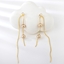 Show details for Copper or Brass Cubic Zirconia Dangle Earrings in Flattering Style