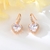 Picture of Love & Heart Rose Gold Plated Dangle Earrings Exclusive Online